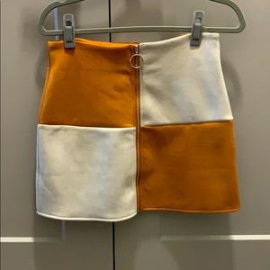 orange and white suede skirt with zip front